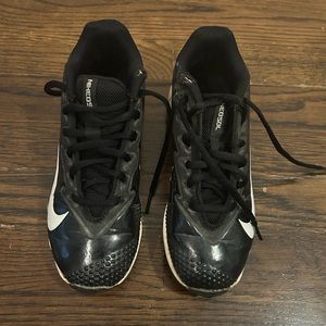 Worn Nike boy’s baseball cleats, sz. 2